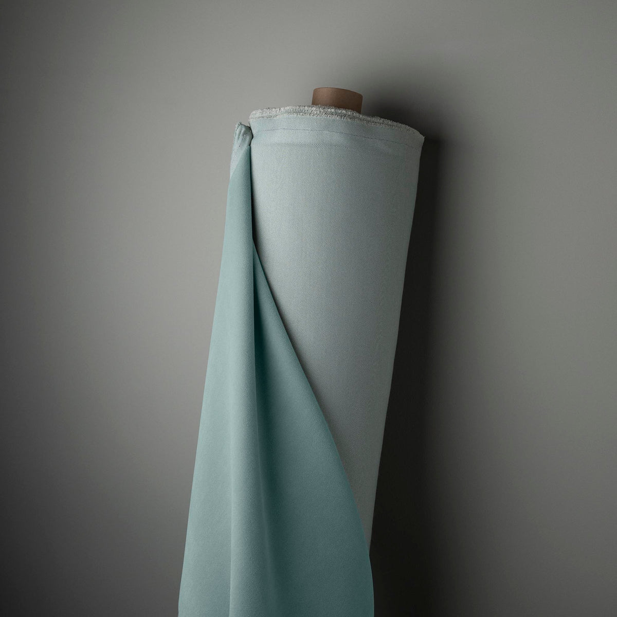 Hither Hexagonal Ottoman in Intelligent Velvet Mineral